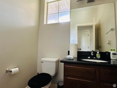 Located in a serene gated community, this beautifully designed on Mulligans Golf and Game in Utah - for sale on GolfHomes.com, golf home, golf lot