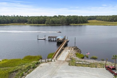 This charming 2BR/1BA home is located in the highly desirable on Glen Dornoch Waterway Golf Links in South Carolina - for sale on GolfHomes.com, golf home, golf lot