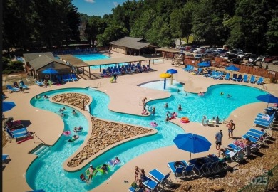 Build your dream vacation retreat or full-time residence on one on Rumbling Bald Resort on Lake Lure in North Carolina - for sale on GolfHomes.com, golf home, golf lot