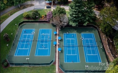 Build your dream vacation retreat or full-time residence on one on Rumbling Bald Resort on Lake Lure in North Carolina - for sale on GolfHomes.com, golf home, golf lot
