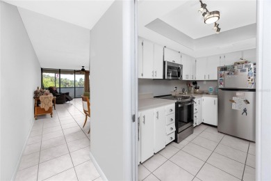 Welcome to this beautifully updated 2-bedroom, 2-bath corner on Cove Cay Country Club in Florida - for sale on GolfHomes.com, golf home, golf lot