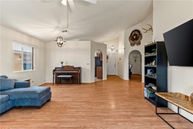 Step into this vibrant Fairway Estates home, where energy meets on Desert Lakes Golf Course in Arizona - for sale on GolfHomes.com, golf home, golf lot