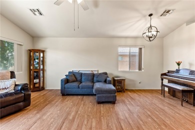 Step into this vibrant Fairway Estates home, where energy meets on Desert Lakes Golf Course in Arizona - for sale on GolfHomes.com, golf home, golf lot