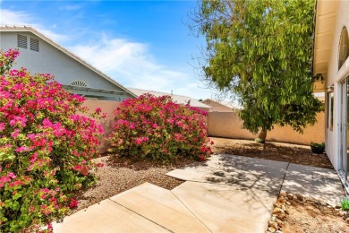 Step into this vibrant Fairway Estates home, where energy meets on Desert Lakes Golf Course in Arizona - for sale on GolfHomes.com, golf home, golf lot