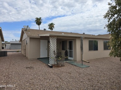 Located in the popular Fountain of the Sun 55+ community, this on Fountain of the Sun Country Club in Arizona - for sale on GolfHomes.com, golf home, golf lot