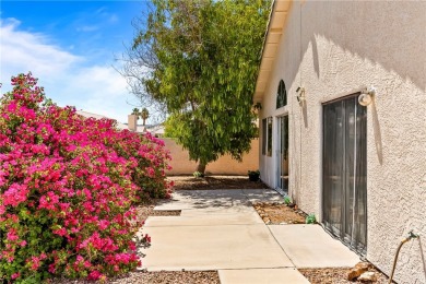 Step into this vibrant Fairway Estates home, where energy meets on Desert Lakes Golf Course in Arizona - for sale on GolfHomes.com, golf home, golf lot