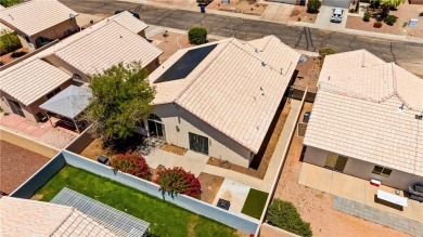 Step into this vibrant Fairway Estates home, where energy meets on Desert Lakes Golf Course in Arizona - for sale on GolfHomes.com, golf home, golf lot