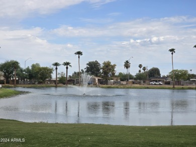 Located in the popular Fountain of the Sun 55+ community, this on Fountain of the Sun Country Club in Arizona - for sale on GolfHomes.com, golf home, golf lot