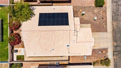 Step into this vibrant Fairway Estates home, where energy meets on Desert Lakes Golf Course in Arizona - for sale on GolfHomes.com, golf home, golf lot