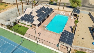 Step into this vibrant Fairway Estates home, where energy meets on Desert Lakes Golf Course in Arizona - for sale on GolfHomes.com, golf home, golf lot