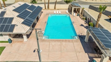 Step into this vibrant Fairway Estates home, where energy meets on Desert Lakes Golf Course in Arizona - for sale on GolfHomes.com, golf home, golf lot