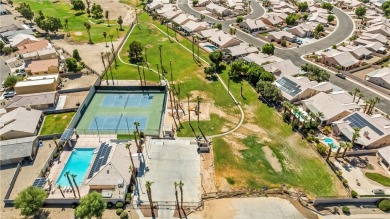 Step into this vibrant Fairway Estates home, where energy meets on Desert Lakes Golf Course in Arizona - for sale on GolfHomes.com, golf home, golf lot