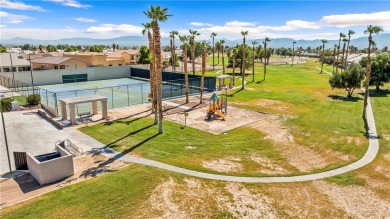 Step into this vibrant Fairway Estates home, where energy meets on Desert Lakes Golf Course in Arizona - for sale on GolfHomes.com, golf home, golf lot