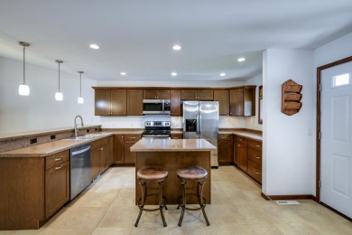 Welcome home to this stunning private-entry condo featuring open on Foxboro Golf Club in Wisconsin - for sale on GolfHomes.com, golf home, golf lot