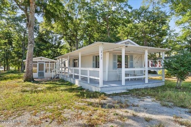 Your Dream Beach Escape Awaits at Sunset Beach! Yes-dreams on Oyster Bay Golf Links in North Carolina - for sale on GolfHomes.com, golf home, golf lot
