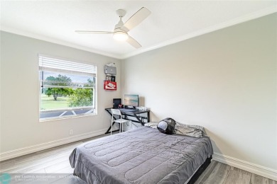 A beautiful, bright and spacious tastefully updated four on The Links At Boynton Beach - The Family Course in Florida - for sale on GolfHomes.com, golf home, golf lot