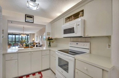 GATED COMMUNITY IN CENTRAL BOCA RATON SPACIOUS 2/2 WITH A on The Country Club At Boca Raton in Florida - for sale on GolfHomes.com, golf home, golf lot