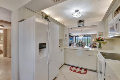 GATED COMMUNITY IN CENTRAL BOCA RATON SPACIOUS 2/2 WITH A on The Country Club At Boca Raton in Florida - for sale on GolfHomes.com, golf home, golf lot