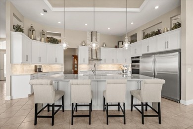 Stunning EXECUTIVE  HOME on a premium lot with SERENE GOLF on Huntington Hills Golf and Country Club in Florida - for sale on GolfHomes.com, golf home, golf lot