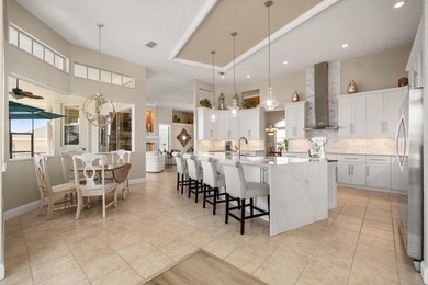 Stunning EXECUTIVE  HOME on a premium lot with SERENE GOLF on Huntington Hills Golf and Country Club in Florida - for sale on GolfHomes.com, golf home, golf lot