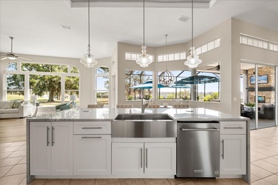 Stunning EXECUTIVE  HOME on a premium lot with SERENE GOLF on Huntington Hills Golf and Country Club in Florida - for sale on GolfHomes.com, golf home, golf lot