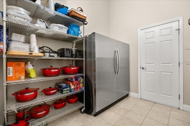 Stunning EXECUTIVE  HOME on a premium lot with SERENE GOLF on Huntington Hills Golf and Country Club in Florida - for sale on GolfHomes.com, golf home, golf lot