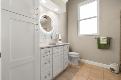 Stunning EXECUTIVE  HOME on a premium lot with SERENE GOLF on Huntington Hills Golf and Country Club in Florida - for sale on GolfHomes.com, golf home, golf lot