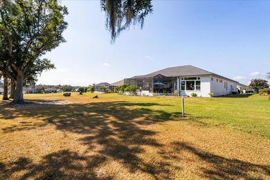 Stunning EXECUTIVE  HOME on a premium lot with SERENE GOLF on Huntington Hills Golf and Country Club in Florida - for sale on GolfHomes.com, golf home, golf lot