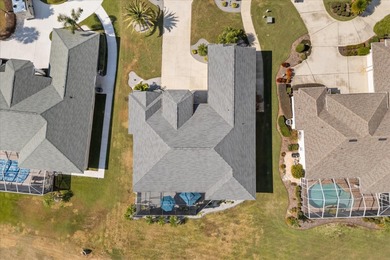 Stunning EXECUTIVE  HOME on a premium lot with SERENE GOLF on Huntington Hills Golf and Country Club in Florida - for sale on GolfHomes.com, golf home, golf lot