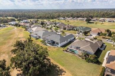 Stunning EXECUTIVE  HOME on a premium lot with SERENE GOLF on Huntington Hills Golf and Country Club in Florida - for sale on GolfHomes.com, golf home, golf lot