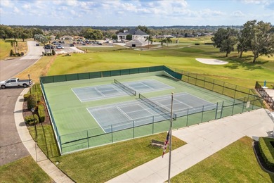 Stunning EXECUTIVE  HOME on a premium lot with SERENE GOLF on Huntington Hills Golf and Country Club in Florida - for sale on GolfHomes.com, golf home, golf lot