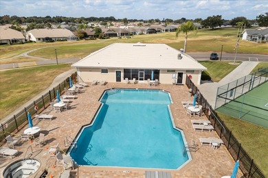 Stunning EXECUTIVE  HOME on a premium lot with SERENE GOLF on Huntington Hills Golf and Country Club in Florida - for sale on GolfHomes.com, golf home, golf lot