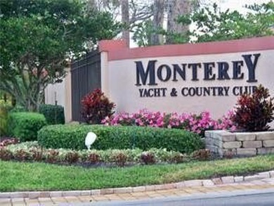 Centrally located on the 2nd floor overlooking the beautifully on Monterey Yacht and Country Club in Florida - for sale on GolfHomes.com, golf home, golf lot