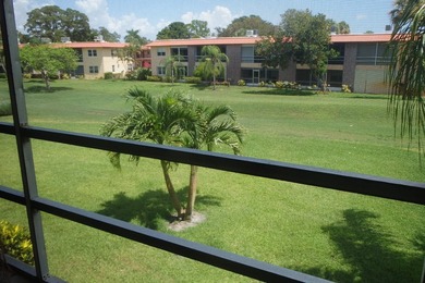 Centrally located on the 2nd floor overlooking the beautifully on Monterey Yacht and Country Club in Florida - for sale on GolfHomes.com, golf home, golf lot