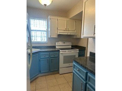 Centrally located on the 2nd floor overlooking the beautifully on Monterey Yacht and Country Club in Florida - for sale on GolfHomes.com, golf home, golf lot