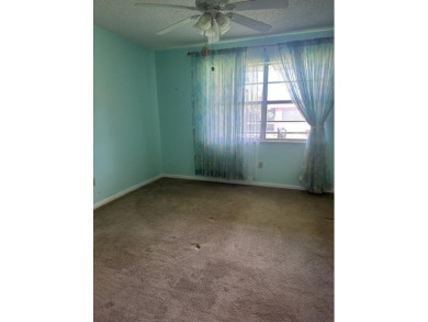 Centrally located on the 2nd floor overlooking the beautifully on Monterey Yacht and Country Club in Florida - for sale on GolfHomes.com, golf home, golf lot