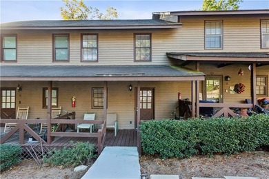 Step into resort-style living with this charming 2-bedroom, 2 on The Highlands Course at Lake Arrowhead in Georgia - for sale on GolfHomes.com, golf home, golf lot