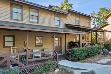 Step into resort-style living with this charming 2-bedroom, 2 on The Highlands Course at Lake Arrowhead in Georgia - for sale on GolfHomes.com, golf home, golf lot