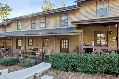 Step into resort-style living with this charming 2-bedroom, 2 on The Highlands Course at Lake Arrowhead in Georgia - for sale on GolfHomes.com, golf home, golf lot