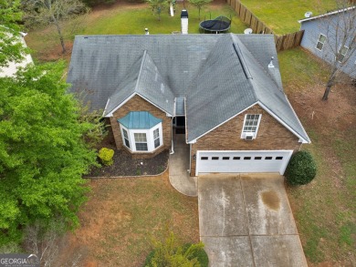 Welcome home to Heron Bay, one of the South's most sought-after on Canongate At Heron Bay in Georgia - for sale on GolfHomes.com, golf home, golf lot