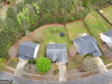 Welcome home to Heron Bay, one of the South's most sought-after on Canongate At Heron Bay in Georgia - for sale on GolfHomes.com, golf home, golf lot