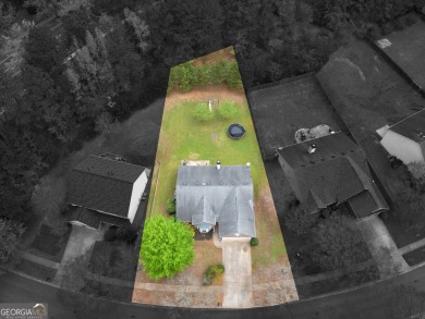 Welcome home to Heron Bay, one of the South's most sought-after on Canongate At Heron Bay in Georgia - for sale on GolfHomes.com, golf home, golf lot