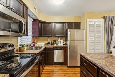 Step into resort-style living with this charming 2-bedroom, 2 on The Highlands Course at Lake Arrowhead in Georgia - for sale on GolfHomes.com, golf home, golf lot