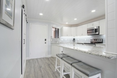 One of kind 2nd floor, 2 bedroom, 2 full bath unit, meticulously on Ocean Village Golf Course in Florida - for sale on GolfHomes.com, golf home, golf lot