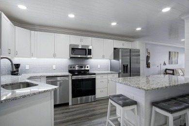One of kind 2nd floor, 2 bedroom, 2 full bath unit, meticulously on Ocean Village Golf Course in Florida - for sale on GolfHomes.com, golf home, golf lot