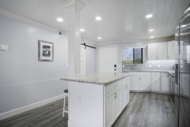 One of kind 2nd floor, 2 bedroom, 2 full bath unit, meticulously on Ocean Village Golf Course in Florida - for sale on GolfHomes.com, golf home, golf lot