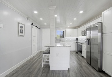One of kind 2nd floor, 2 bedroom, 2 full bath unit, meticulously on Ocean Village Golf Course in Florida - for sale on GolfHomes.com, golf home, golf lot