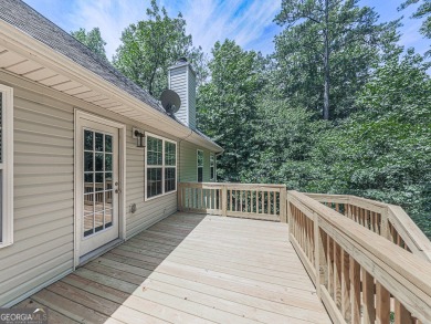 Welcome to this charming 5-bedroom, 3-bath brick home situated on Fairfield Plantation Golf and Country Club in Georgia - for sale on GolfHomes.com, golf home, golf lot