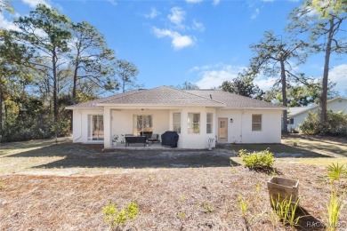 Welcome to this beautiful and spacious 3-bedroom, 2-bath home on Sugarmill Woods Golf and Country Club in Florida - for sale on GolfHomes.com, golf home, golf lot