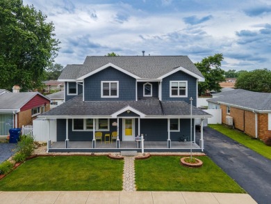 This stunning two-story home with an expansive and inviting on Waters Edge Golf Club in Illinois - for sale on GolfHomes.com, golf home, golf lot
